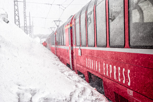 Bernina Express: riding the Alps by train - The train waiting for departure at Ospizio Bernina Station