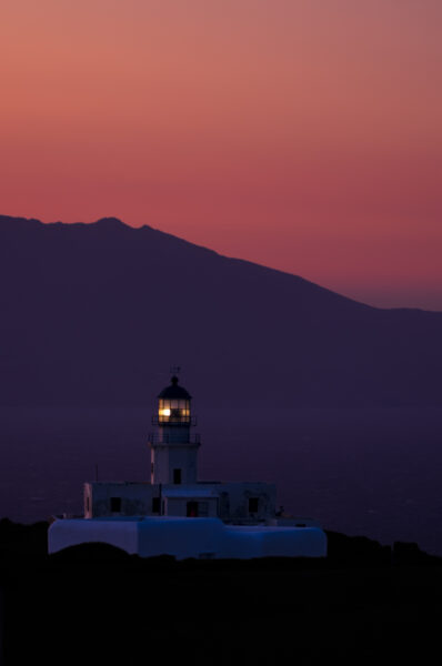 Out of the crowd in Mykonos for beautiful landscape photos, Blue hour at the lighthouse. Armenisti lighthouse, Mykonos, Cyclades, Greece