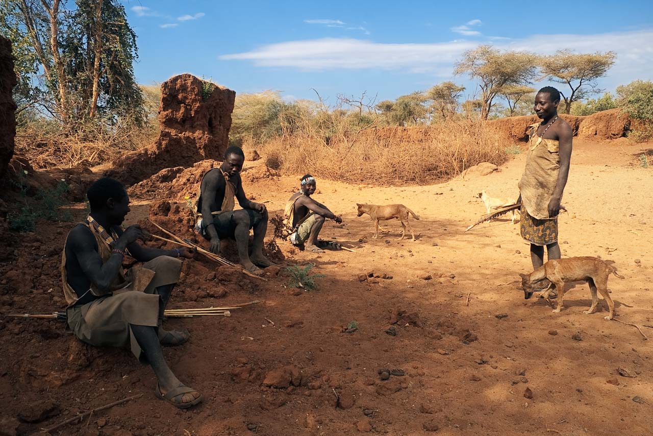 Hadzabe people relaxing during a hunting trip